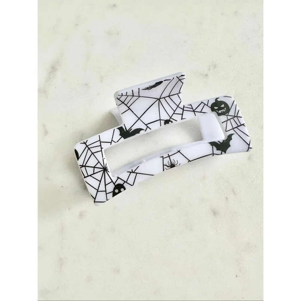 Black and white spiderweb & bat hair claw